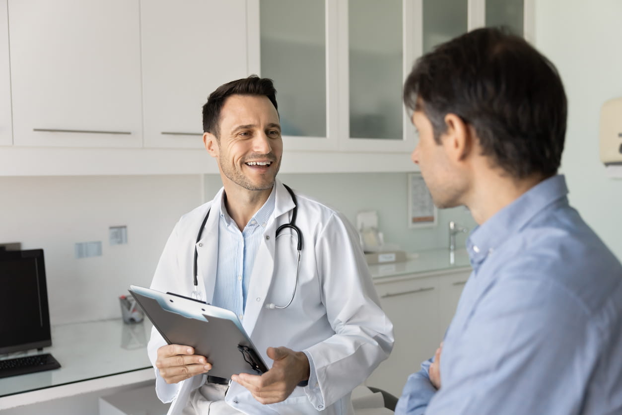 Common reasons men stop testosterone replacement therapy TRT monitoring and personalized testosterone treatment in Calgary Calgary doctor reviewing testosterone therapy results with a patient